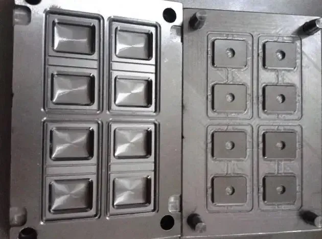 Metal mold tooling with rectangular silicone component cavities
